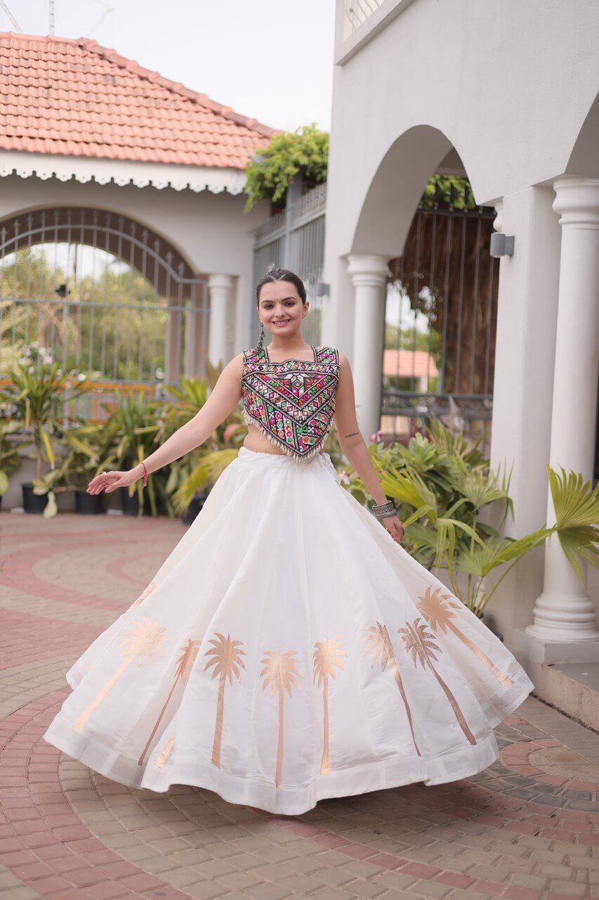 White Roman Lehenga Choli with Coconut Gota Work & Kutchi Gamthi Embroidered Blouse