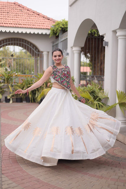 White Roman Lehenga Choli with Coconut Gota Work & Kutchi Gamthi Embroidered Blouse