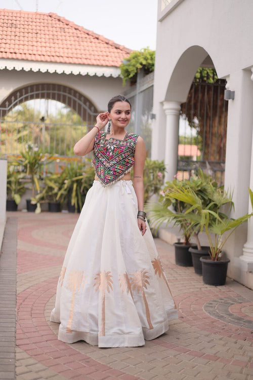 White Roman Lehenga Choli with Coconut Gota Work & Kutchi Gamthi Embroidered Blouse