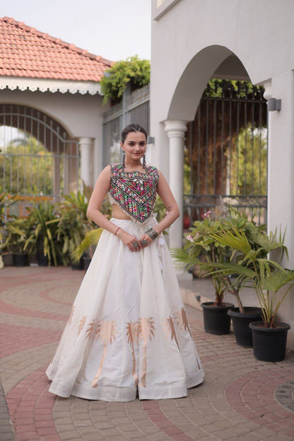White Roman Lehenga Choli with Coconut Gota Work & Kutchi Gamthi Embroidered Blouse