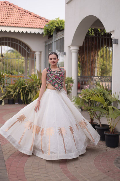 White Roman Lehenga Choli with Coconut Gota Work & Kutchi Gamthi Embroidered Blouse