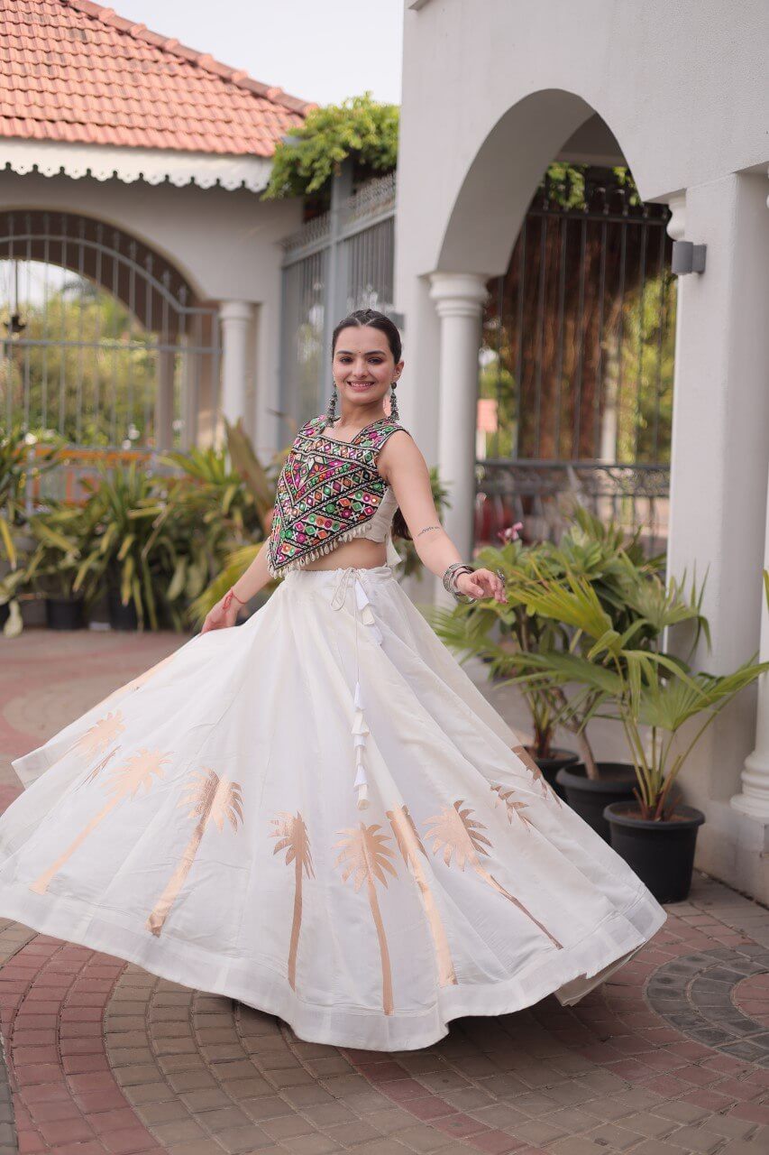 White Roman Lehenga Choli with Coconut Gota Work & Kutchi Gamthi Embroidered Blouse