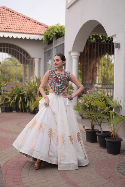 White Roman Lehenga Choli with Coconut Gota Work & Kutchi Gamthi Embroidered Blouse