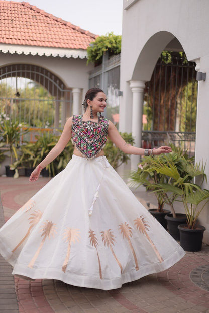 White Roman Lehenga Choli with Coconut Gota Work & Kutchi Gamthi Embroidered Blouse