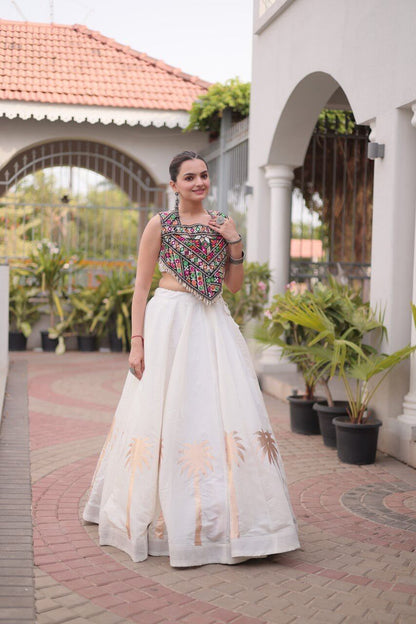 White Roman Lehenga Choli with Coconut Gota Work & Kutchi Gamthi Embroidered Blouse