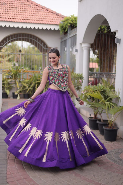 Purple Kutchi Gamthi embroidered lehenga choli with gold coconut gota work, full flared skirt in motion, front view