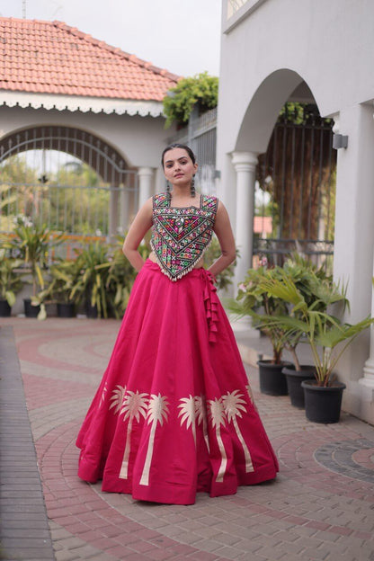 Magenta pink lehenga choli with colorful Kutchi Gamthi embroidered blouse and gold Coconut Gota hem work