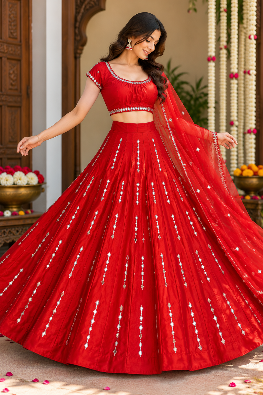 Dynamic full-length shot showcasing the wide circular flare and vertical mirror-work panels of a bright red festive lehenga skirt.