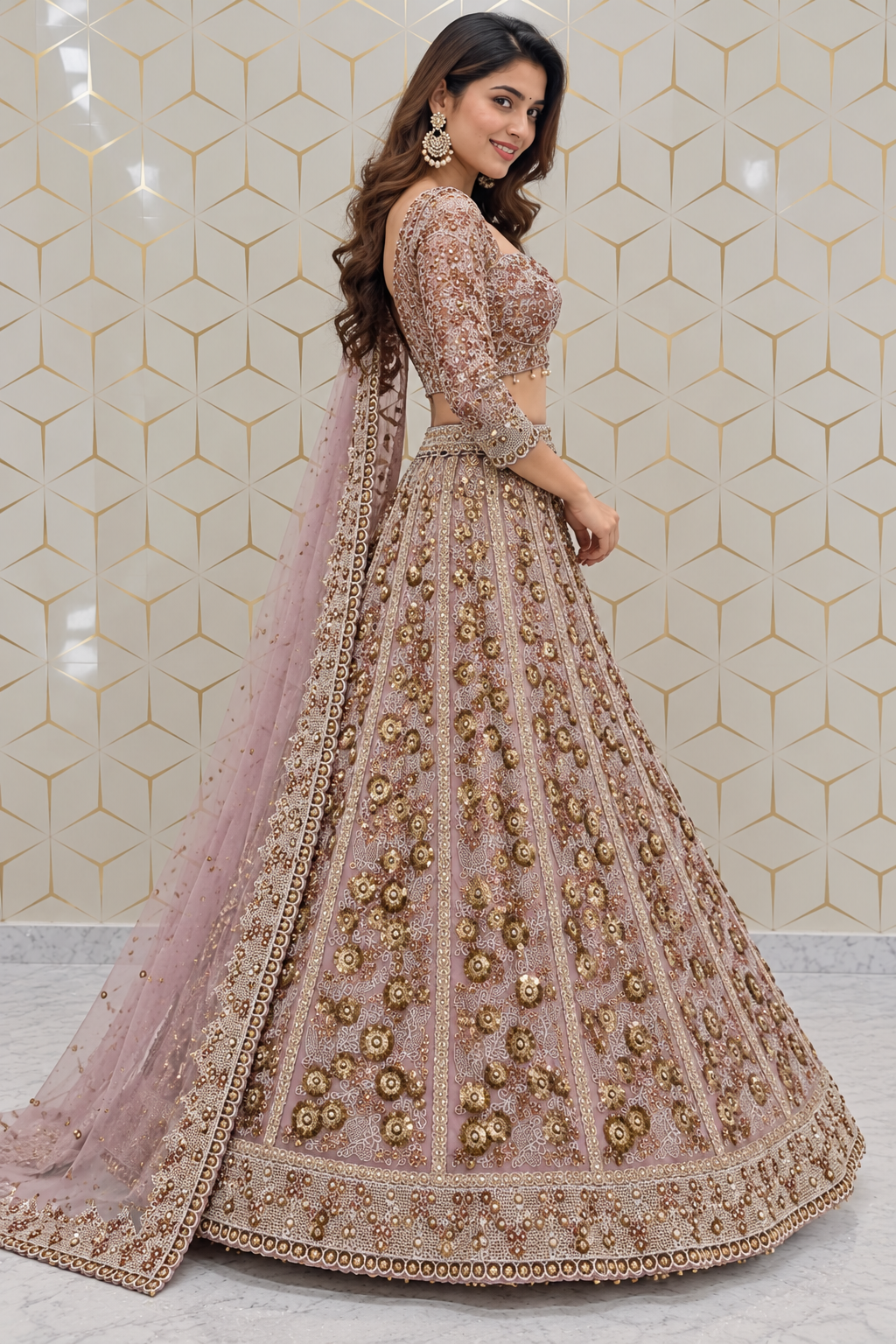 Side profile full-length view of a model wearing a dusty mauve bridal lehenga skirt adorned with 3D gold floral sequin kalis and three-quarter sleeve blouse.