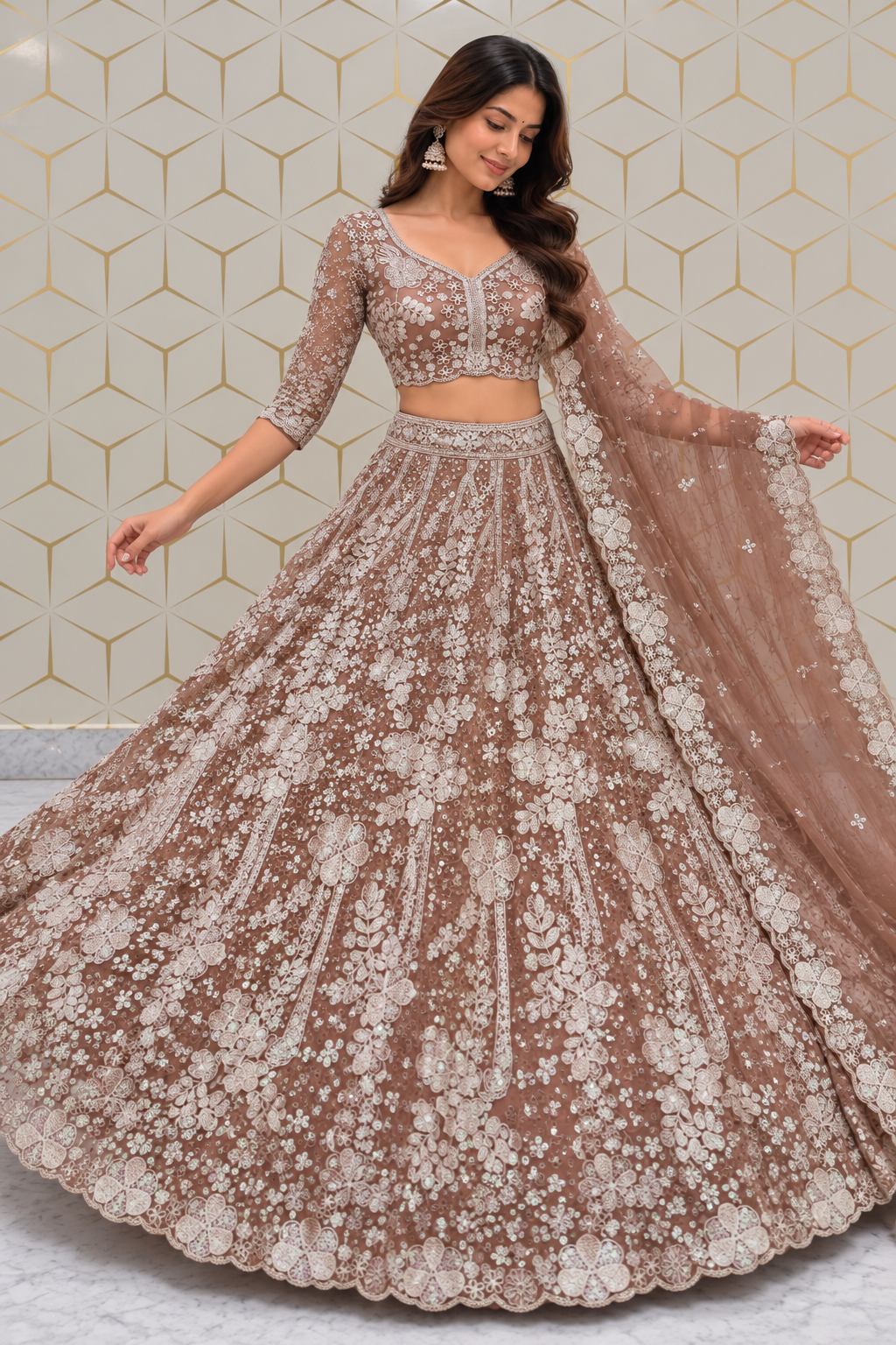 Standing full-length shot showcasing the expansive circular flare and intricate floral jal embroidery of a dusty mauve net lehenga skirt.