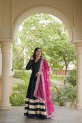 Teal Gown with Magenta Leheriya Dupatta and Embellished Border