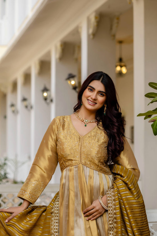 Golden Banarasi Silk Gown with Heavy Embroidery and Lace Dupatta