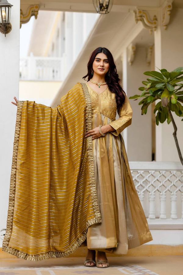 Golden Banarasi Silk Gown with Heavy Embroidery and Lace Dupatta