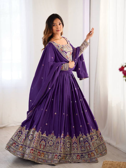 Full-length side-angle shot of purple flared lehenga choli with detailed border embroidery and draped dupatta