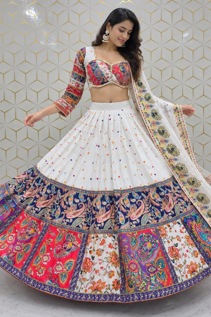 Full-length shot of a model holding the expansive circular flare of a white and multicolor printed lehenga skirt with three-quarter sleeve choli.